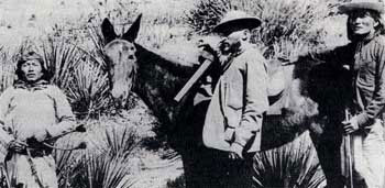 Picture of General George Crook with two Apache scouts, Dutch and Alchise.